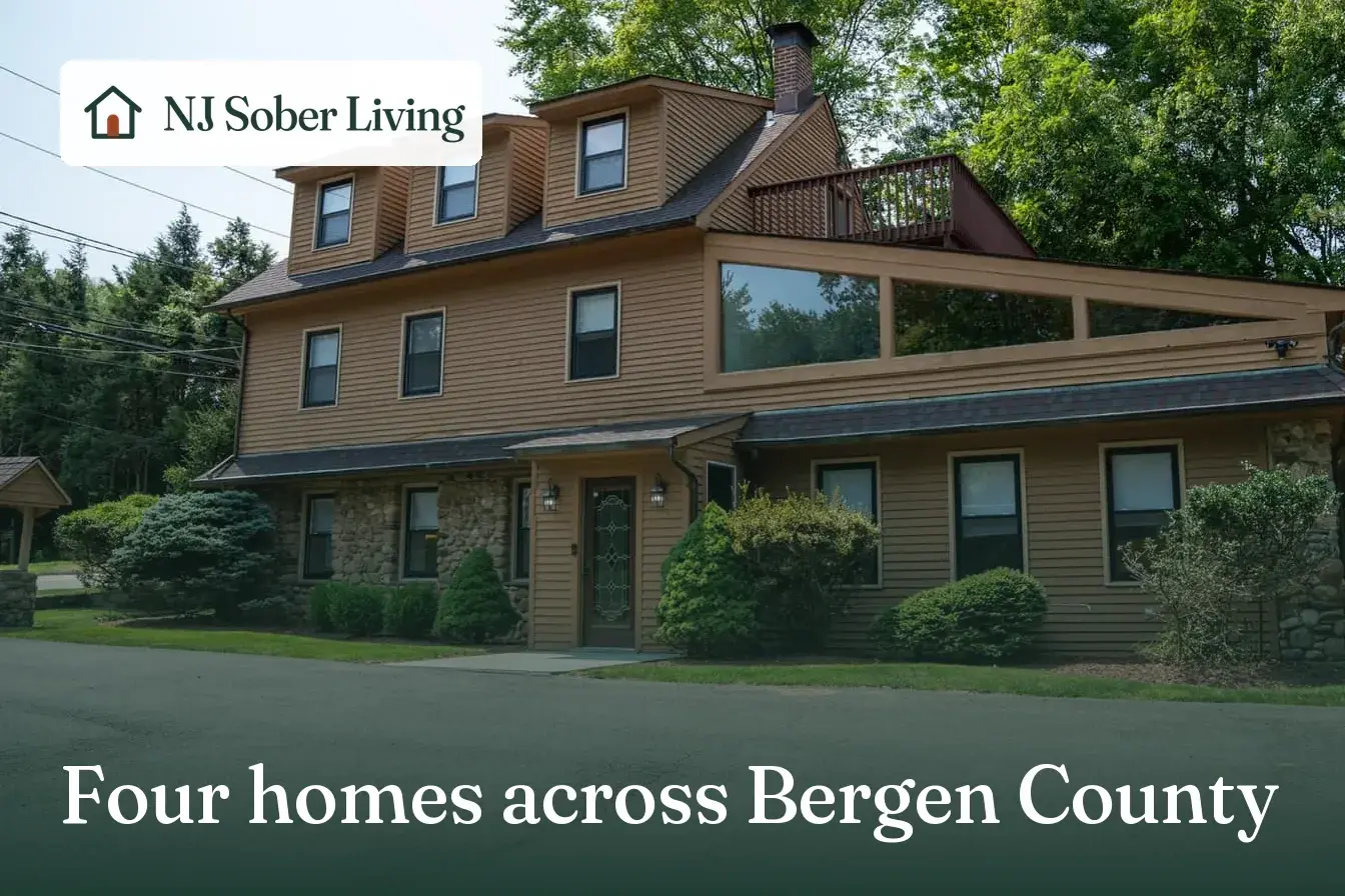 Asking about weekly rent and an open bed at NJ Sober Living: the Old Tappan home from the street, with the NJ Sober Living logo and "Four homes across Bergen County" text
