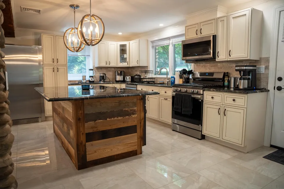 Shared kitchen with an island in the Old Tappan house